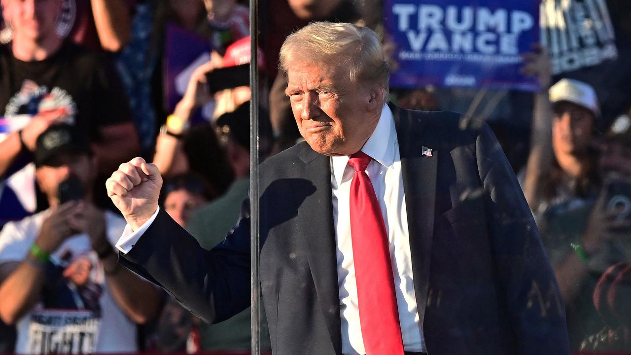 Donald Trump gestures as he arrives for a campaign rally at Calhoun Ranch in Coachella, California. Picture: AFP