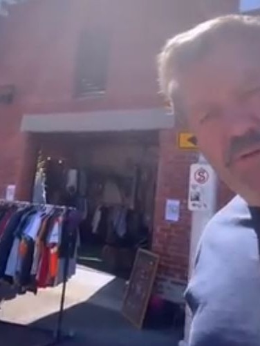 Brian Taylor tours the garage sale in Fitzroy.