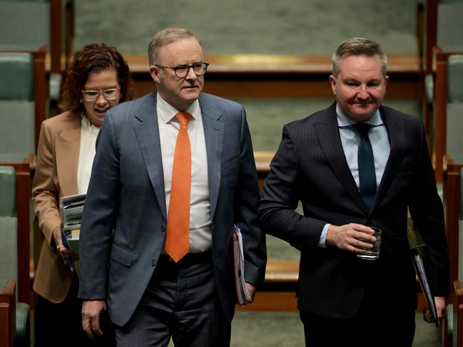 CANBERRA, AUSTRALIA - AUGUST 22: Prime Minister Anthony Albanese with Minister for Climate Change and Energy of Australia Chris Bowen (R) during Question Time in the House of Representatives at Australian Parliament House on August 22, 2024 in Canberra, Australia. Pressure is building on the Albanese government on a number of fronts, but cost of living pressures are top among them and may prove to be a damaging political liability in the months ahead as Peter Dutton gets the opposition ready for next year's election season. (Photo by Tracey Nearmy/Getty Images)