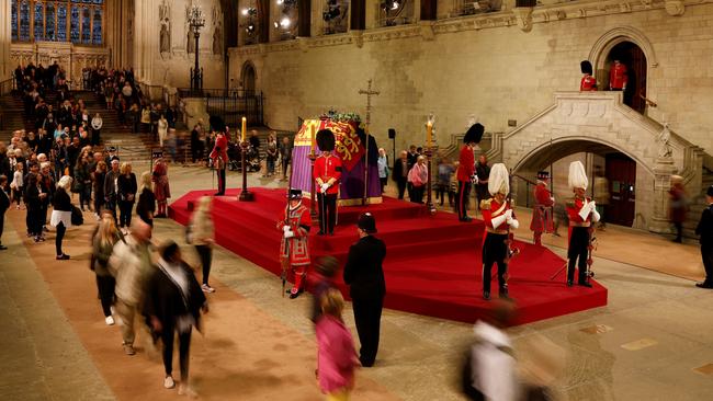 Members of the public pay their respects as they pass the coffin of Queen Elizabeth II in Westminster Hall on Thursday. Picture: Getty Images