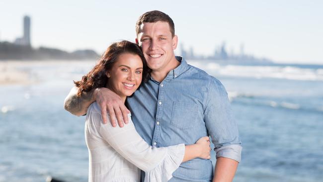 Courtney Thorpe and Jarrod Wallace at home on the Gold Coast. Picture by Luke Marsden.