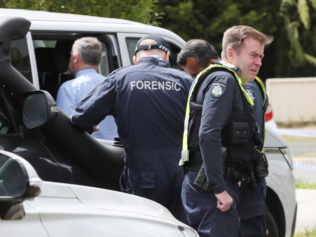 Police at the property in Ballarat. Picture: David Crosling