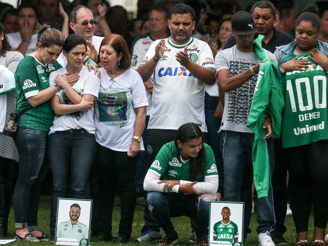 Relatives of the members of Brazilian team Chapecoense Real pay a tribute at the club's Arena Conda stadium in Chapec. Picture: Buda Mendes/Getty Images