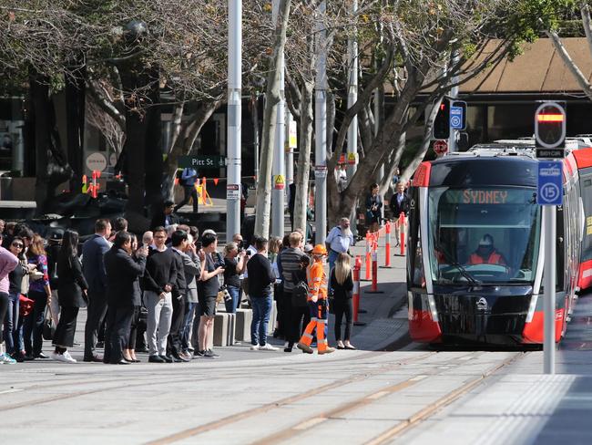 A new tram approaching a tram stop at Circular Quay following a first ride down George Street on Sydneys new light rail system. Picture: Richard Dobson