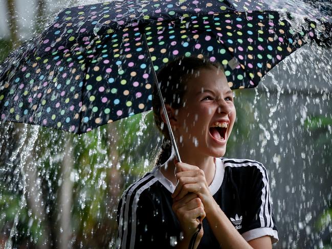Tamsin Groves 12 of Fannie Bay is wrapped in the coping 100% chance of rain according to BOM predictions.Picture GLENN CAMPBELL