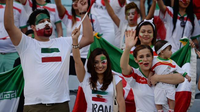 Iran fans cheer before Group C football match against Qatar in the AFC Asian Cup in Sydney on January 15, 2015. AFP PHOTO / Peter PARKS --IMAGE RESTRICTED TO EDITORIAL USE - STRICTLY NO COMMERCIAL USE