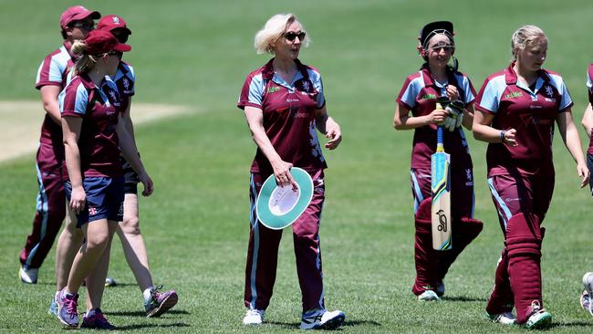 Catherine McGregor, centre, plays in winning Canberra women's cricket team Western Districts/University of Canberra in a 20/20 match in 2016.