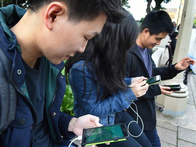 See hordes of people walking around, head-down and smartphone in hand? It’s the Pokemon factor. Picture: Stephen Cooper