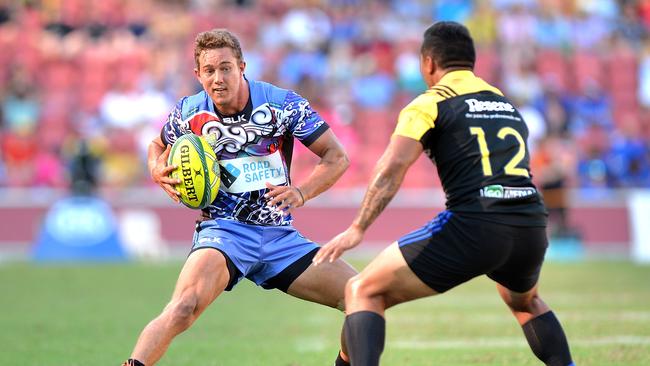 James Verity-Amm of the Force takes on the Hurricanes defence at the Brisbane Tens.