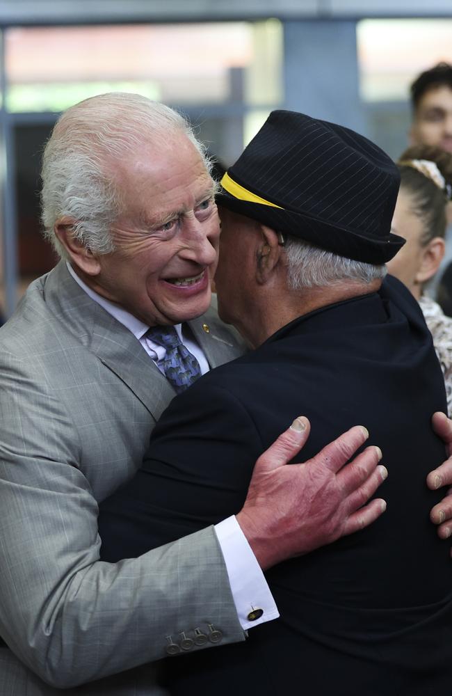 King Charles III embraces a member of the Indigenous community during a visit to the National Centre for Indigenous Excellence. Picture: Getty