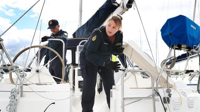 Raymundo Dando senior border force officer with Teagan Stefanovic border force officer on a yacht at Bellerive marina. Border Force officers at Bellerive marina. Picture: Nikki Davis-Jones