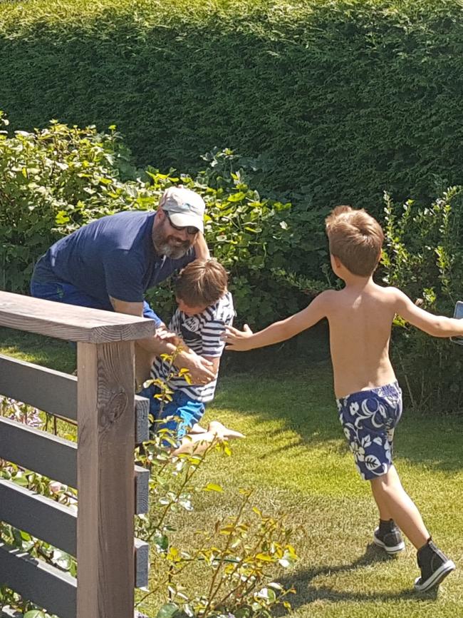 Playtime... Adam with his children in Sweden.