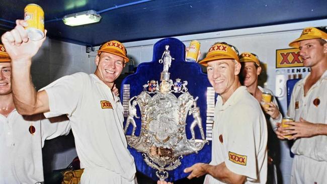 BREAKING THE DROUGHT: Ipswich regional cricketers Dick Tazelaar and Andy Bichel share in Queensland's first Sheffield Shield victory after nearly seven decades of torment. Picture: QT file