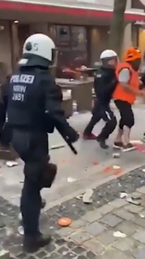 Moment Netherlands and England supporters clash outside Euros semi