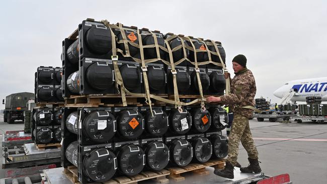 A Ukrainian serviceman receives the delivery of FGM-148 Javelins, American man-portable anti-tank missiles. Picture: AFP