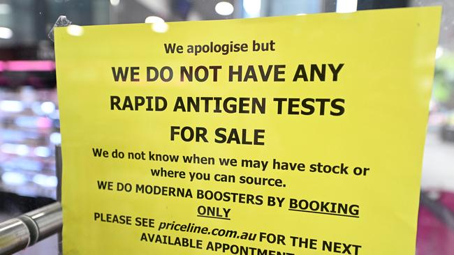 A sign on the front door of a pharmacy informing customers that RAT tests are unavailable. Picture: NCA NewsWire / Dan Peled