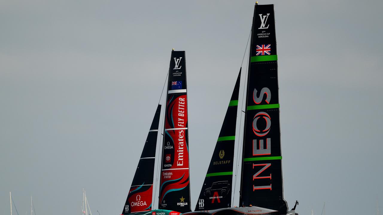 BARCELONA, SPAIN - OCTOBER 13: The crew of both boats compete during the race between Emirates Team New Zealand and Team Ineos Britannia in the 37th America's Cup on October 13, 2024 in Barcelona, Spain. (Photo by David Ramos/Getty Images)