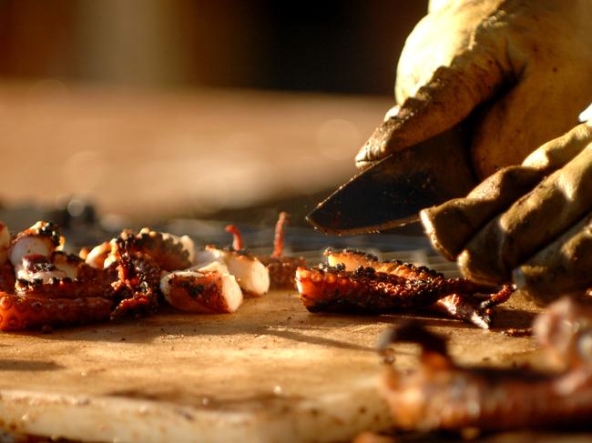 Day two of the 22nd annual Greek Glenti Festival on The Esplanade. Octopus preparation.