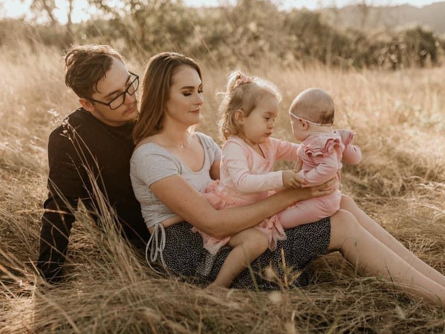 Brendan Tyrrell and his wife Aliesha with their young children.