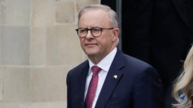 Prime Minister Anthony Albanese has worn a pair of South Sydney Rabbitohs socks to the coronation of King Charles. ,