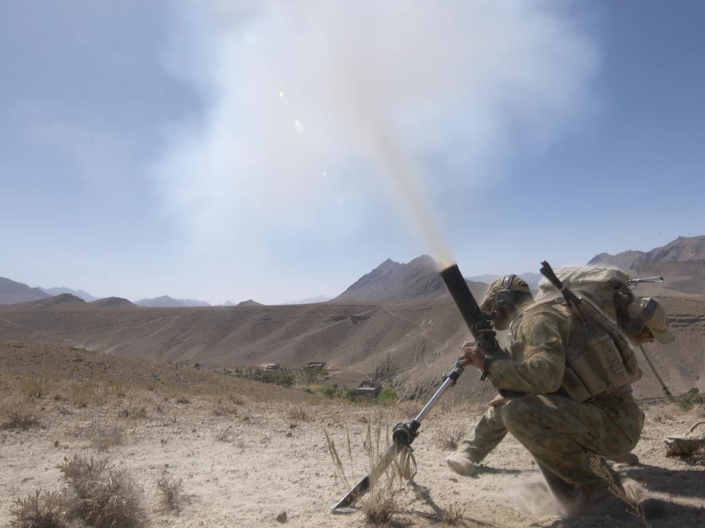 Soldiers from the Special Operations Task Group fire mortars on a Taliban position during a counter insurgency operation in Oruzgan Province, Afghanistan. Picture: Department of Defence