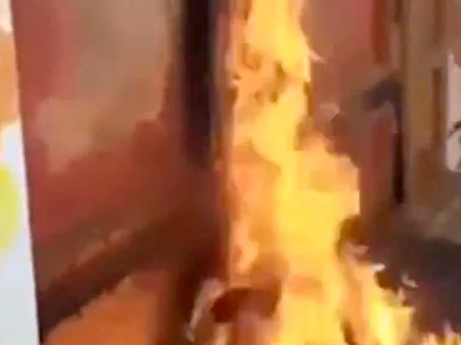 Social media footage of the blaze at the front door of Old Parliament House.