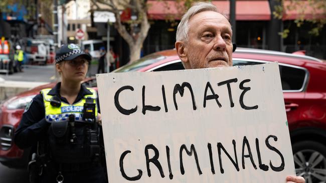 Protesters from Extinction Rebellion among other climate action groups on parliament Steps in Adelaide. Picture: NCA NewsWire / Morgan Sette