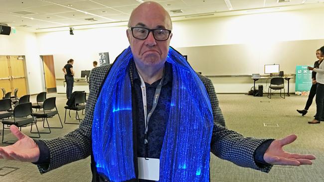 Journalist Chris Griffith tries on lightwear at Microsoft's headquarters in Seattle.