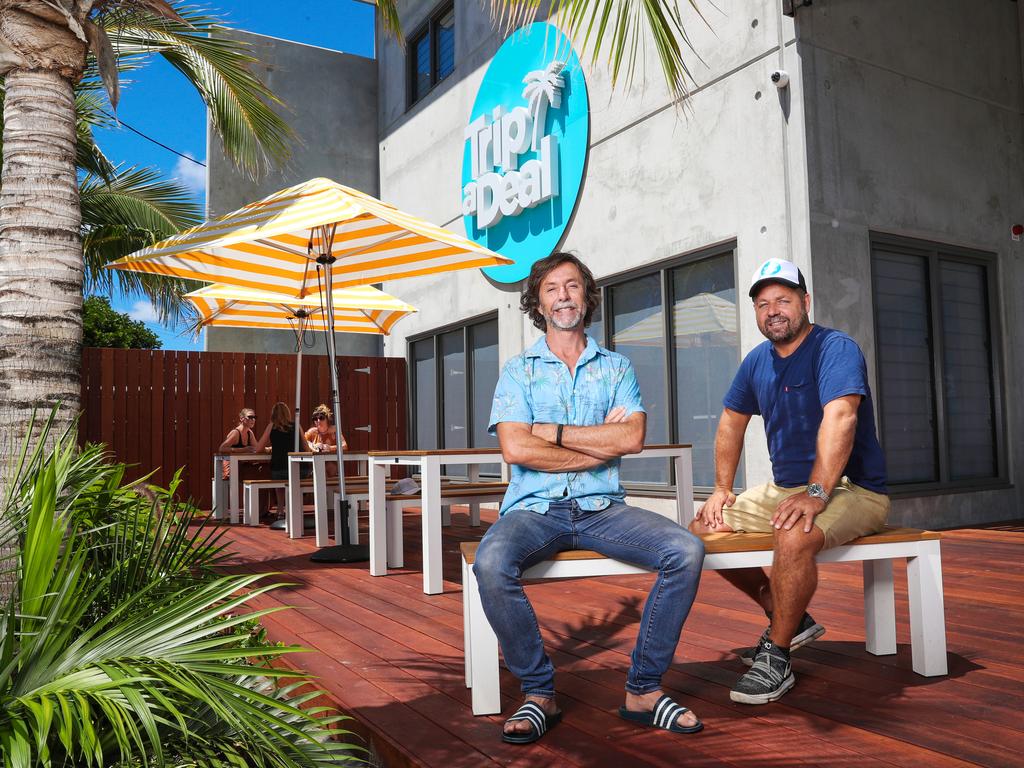 ** QBM.Richard Johnston and Norm Black (wearing hat)have turned their Byron Bay travel business Tripadeal into a $100million global company. Picture: NIGEL HALLETT