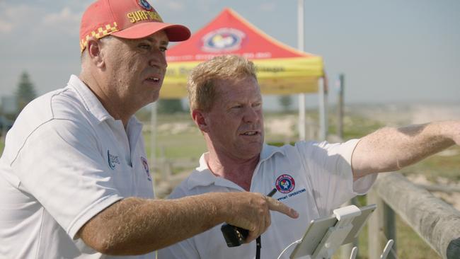 Surf Life Saving Central Coast director of lifesaving Brett Beswick and drone operator Paul Kenny.