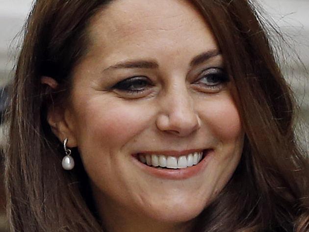 Britain's Prince William and Kate, Duchess of Cambridge and their newborn baby princess, pose for the media as they leave St. Mary's Hospital's exclusive Lindo Wing, London, Saturday, May 2, 2015. Kate, the Duchess of Cambridge, gave birth to a baby girl on Saturday morning. (AP Photo/Kirsty Wigglesworth)