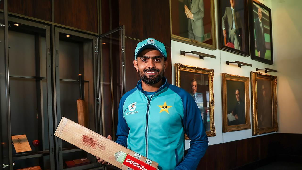 Pakistani international cricketer Babar Azam with the bat he is donating to the MCC Long Room. Picture: Ian Currie