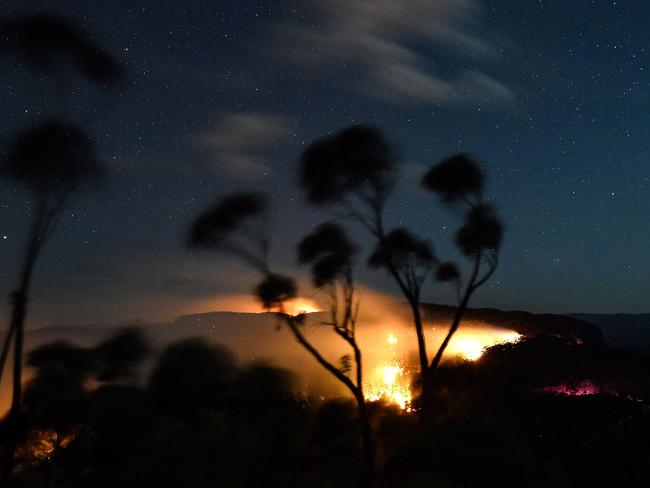 A bushfire burns out of control in the Blue Mountains on Monday. Picture: Saeed Khan/AFP