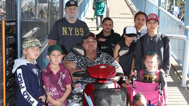 Doonside lift campaigner Warren Hardy with residents at the station in July 2018. Picture: David Swift