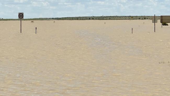 Floodwaters covered the road from Birdsville to the Big Red sand dune. Picture: Trevor Wright
