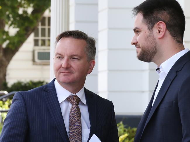 Shadow Treasurer Chris Bowen (left) talks with Labor candidate for Higgins Josh Spiegel before holding a press conference in Malvern to comment on the outcome of the Banking Royal Commission in Melbourne, Thursday, February 7, 2019. (AAP Image/David Crosling) NO ARCHIVING