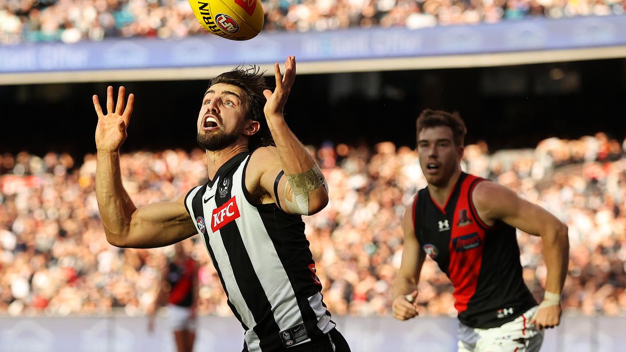 Josh Daicos taps the ball to himself along the boundary line. Picture: Mark Stewart