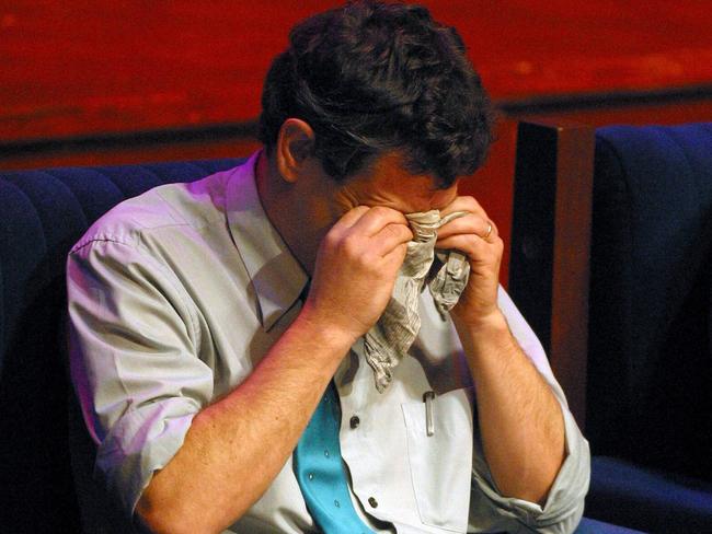 Prof Inder shows emotion during a memorial service at Monash University. Picture: HWT library