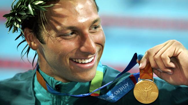 Thorpe with his gold medal after winning the 200m at Athens in 2004.