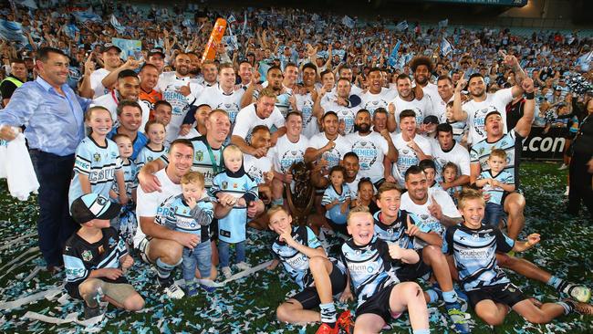 SYDNEY, AUSTRALIA — OCTOBER 02: The Sharks team pose for a team photo as they celebrate victory after the 2016 NRL Grand Final match between the Cronulla Sharks and the Melbourne Storm at ANZ Stadium on October 2, 2016 in Sydney, Australia. (Photo by Mark Kolbe/Getty Images)