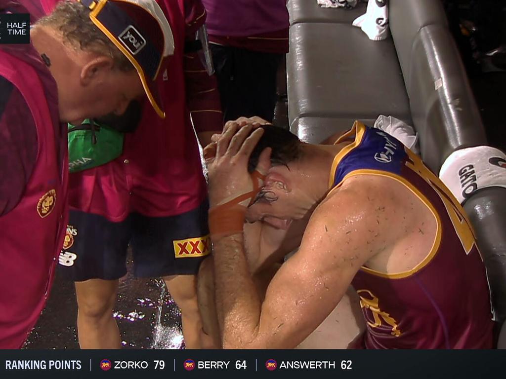 Oscar McInerney is assessed for a head injury.