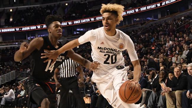 CHICAGO, IL - MARCH 29: Brian "Tugs" Bowen II #20 of the boys west team is defended by Lonnie Walker IV #14 of the boys east team during the 2017 McDonalds's All American Game on March 29, 2017 at the United Center in Chicago, Illinois. (Photo by David Banks/Getty Images)