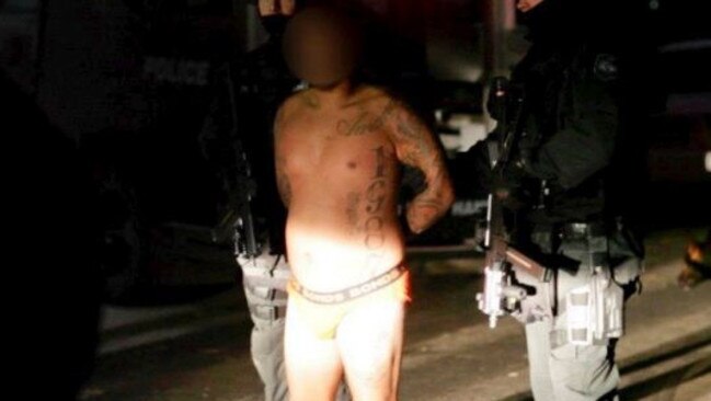 Kemel Barakat, under arrest in 2013. Photo: NSW Police