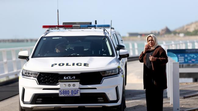 Fahima Habibi with police at Granite Island. Picture: Kelly Barnes