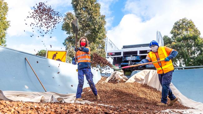 Bayside Council is filling its skate parks and bowls to stop people using them. Council workers fill the Royal Ave Skate Park in Sandringham with gravel. Picture: Jake Nowakowski