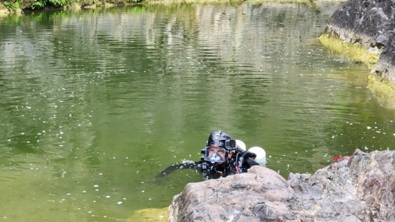 Divers search Kinbombi Falls for missing personal trainer