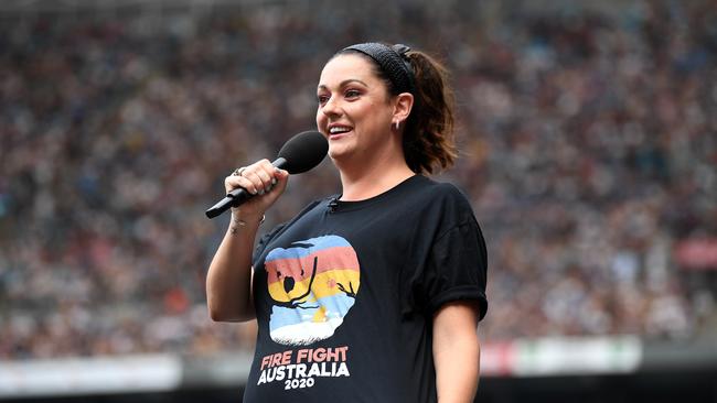 Celeste Barber speaks during the Fire Fight Australia bushfire relief concert at ANZ Stadium in Sydney. Picture: AAP