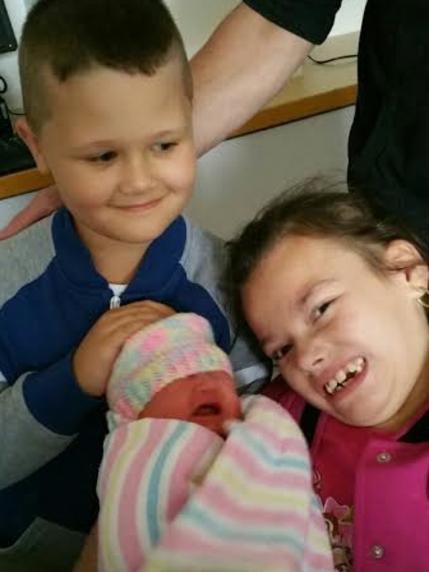 Alyssa McCartney with brother Ashton and baby sister Alexis.