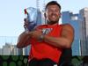MELBOURNE.  26/01/2022. Australian Open Tennis.  Day 10. Australian of the Year Dylan Alcott with the Australian of there Year trophy at Melbourne Park this morning.     Photo by Michael Klein