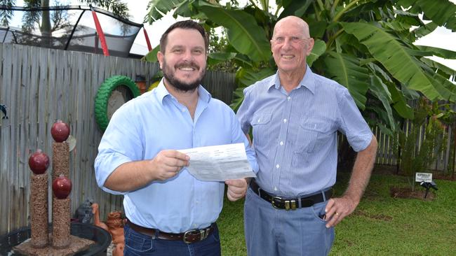 Phillip Thompson (left) with Mount Low resident Jack Blissett in May, 2023. Mr Blissett saved 40 per cent on his home insurance by switching from NRMA to Sure Insurance.